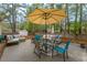 Spacious backyard patio with comfortable seating, a fire pit, and space for outdoor entertaining at 234 Lipman St, Summerville, SC 29483