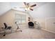 Upstairs bedroom with sloped walls, carpeted floors, and ample natural light at 234 Lipman St, Summerville, SC 29483