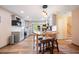 Charming kitchen with an island, stainless steel appliances, light grey cabinets, and bright natural light at 234 Lipman St, Summerville, SC 29483