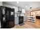 Beautiful kitchen with stainless steel appliances and fixtures, light grey cabinets, and hardwood floors at 234 Lipman St, Summerville, SC 29483