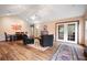Open-concept living room featuring a vaulted ceiling and seamless transition to the dining area at 234 Lipman St, Summerville, SC 29483