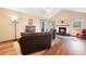 Inviting living room featuring vaulted ceilings, fireplace, and plush seating at 234 Lipman St, Summerville, SC 29483