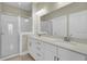 Bathroom with double vanity, framed mirror, and glass enclosed shower at 2681 Park West Blvd, Mount Pleasant, SC 29466