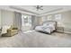Spacious bedroom with a tray ceiling, and neutral tones at 2681 Park West Blvd, Mount Pleasant, SC 29466