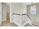 Upstairs hallway with views to the staircase at 2681 Park West Blvd, Mount Pleasant, SC 29466