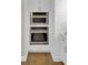 A stainless steel microwave and oven are integrated into the white cabinetry at 2681 Park West Blvd, Mount Pleasant, SC 29466