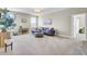 Spacious living room with light-colored walls and plush gray sofa at 2681 Park West Blvd, Mount Pleasant, SC 29466