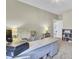 Bright office with a large desk, stylish seating, and a storage unit at 2681 Park West Blvd, Mount Pleasant, SC 29466
