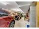 Spacious garage featuring multiple vehicles and ample storage space at 27 Waterway Island Dr, Isle of Palms, SC 29451