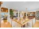 Spacious hallway showcasing hardwood floors, decorative pillars, and elegant lighting fixtures at 27 Waterway Island Dr, Isle of Palms, SC 29451