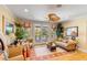Bright living room with French doors opening to a lovely outdoor porch at 27 Waterway Island Dr, Isle of Palms, SC 29451