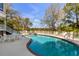 Sparkling pool with poolside seating, perfect for relaxation and entertaining at 27 Waterway Island Dr, Isle of Palms, SC 29451