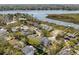 Aerial view of a waterfront neighborhood with boat docks and scenic river views at 28 Rebellion Rd, Charleston, SC 29407