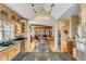 Open-concept kitchen flows into a living room with an island and stainless steel appliances at 28 Rebellion Rd, Charleston, SC 29407