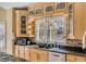 Well-appointed kitchen featuring custom cabinets, granite countertops, and modern appliances at 28 Rebellion Rd, Charleston, SC 29407
