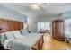 Spacious main bedroom with ample natural light, and hardwood floors at 28 Rebellion Rd, Charleston, SC 29407