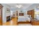 Serene main bedroom with a fireplace, hardwood floors, and a classic design at 28 Rebellion Rd, Charleston, SC 29407