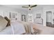 Spacious bedroom with ceiling fan, walk-in closet, and view of the ensuite bath at 2830 Backman St, Mount Pleasant, SC 29466