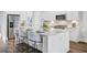 Bright, modern kitchen island with seating, stainless steel appliances, and stylish finishes at 2830 Backman St, Mount Pleasant, SC 29466
