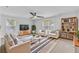 Bright living room features a ceiling fan and comfortable seating at 2830 Backman St, Mount Pleasant, SC 29466