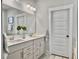 Bright bathroom with double sinks, modern fixtures, and a soaking tub at 2901 Backman St, Mount Pleasant, SC 29466