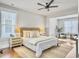 Cozy primary bedroom with a comfortable bed, stylish decor, and ample natural light at 2901 Backman St, Mount Pleasant, SC 29466