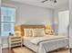 Bright bedroom featuring a cozy bed, natural textures, and neutral color scheme at 2901 Backman St, Mount Pleasant, SC 29466