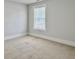 Unfurnished room with a window and neutral color scheme offers possibilities for customization at 2901 Backman St, Mount Pleasant, SC 29466