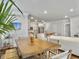 Charming dining area adjacent to the kitchen and featuring a wooden table and stylish decor at 2901 Backman St, Mount Pleasant, SC 29466