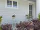 Inviting front porch with outdoor seating and vibrant flowering plants at 2901 Backman St, Mount Pleasant, SC 29466