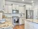 Stylish kitchen showcasing stainless steel appliances, a central island, and modern finishes at 2901 Backman St, Mount Pleasant, SC 29466