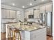 Bright and airy kitchen featuring a central island, stainless steel appliances, and stylish barstool seating at 2901 Backman St, Mount Pleasant, SC 29466