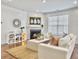 Inviting living room featuring a fireplace, neutral decor, and comfortable seating, perfect for relaxation at 2901 Backman St, Mount Pleasant, SC 29466