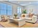 Bright living room with comfortable seating, modern decor, and plenty of natural light, ideal for relaxing at 2901 Backman St, Mount Pleasant, SC 29466