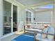 Covered patio with outdoor seating overlooking a backyard with ample sunlight at 2901 Backman St, Mount Pleasant, SC 29466