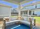 Relaxing screened patio with outdoor seating and views of the backyard at 2901 Backman St, Mount Pleasant, SC 29466