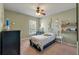 bedroom with a ceiling fan and built-in shelving for toys and decor at 2940 Amberhill Way, Charleston, SC 29414