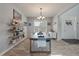 Cozy dining room with ample natural light and decorative shelving at 2940 Amberhill Way, Charleston, SC 29414