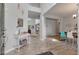 Welcoming entryway leading to open living spaces, featuring wood-look floors at 2940 Amberhill Way, Charleston, SC 29414