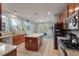 Large kitchen with stainless steel appliances and island and open view to other rooms in the house at 2940 Amberhill Way, Charleston, SC 29414