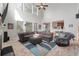Spacious living room with high ceilings, a ceiling fan, and large windows at 2940 Amberhill Way, Charleston, SC 29414
