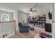 Upstairs living room features comfortable seating and built-in bookshelves for a relaxing space at 2940 Amberhill Way, Charleston, SC 29414