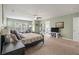 Spacious main bedroom features a ceiling fan and a view to the ensuite bathroom at 2940 Amberhill Way, Charleston, SC 29414