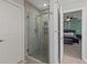 Walk-in shower features glass enclosure, tile surround and shampoo nook at 2940 Amberhill Way, Charleston, SC 29414