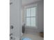 Bright bathroom features subway tile shower and neutral finishes at 3 1/2 Maranda Holmes St # B, Charleston, SC 29403