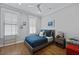 Bright bedroom features a ceiling fan and ample natural light at 3 1/2 Maranda Holmes St # B, Charleston, SC 29403