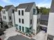 Three-story home featuring a gray roof and siding, plus a rooftop patio space at 3 1/2 Maranda Holmes St # B, Charleston, SC 29403