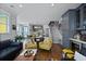 Open concept living space featuring a modern staircase and comfortable seating at 3 1/2 Maranda Holmes St # B, Charleston, SC 29403