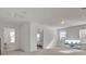Bright bonus room with white walls and natural light from the multiple windows at 307 Blue Oak Dr, Moncks Corner, SC 29461