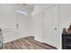 Bright foyer with hardwood flooring and white trim, leading into the home at 307 Blue Oak Dr, Moncks Corner, SC 29461